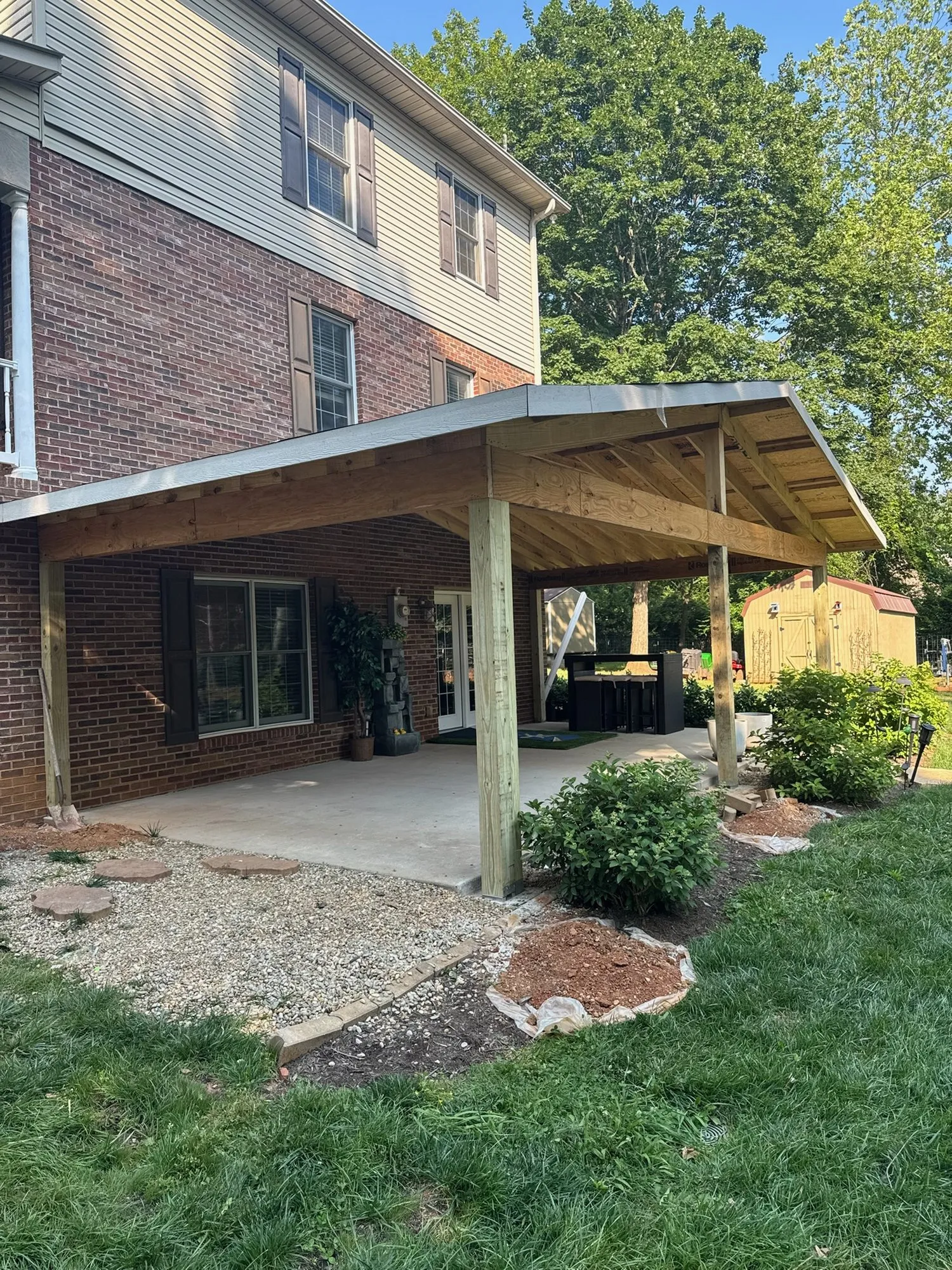Covered patio with wood ceiling