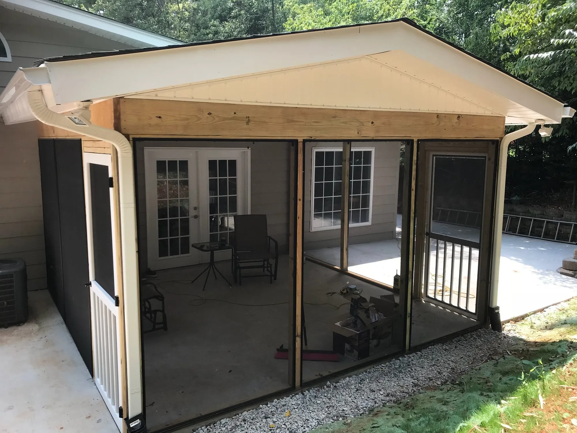 Screen porch enclosure with french doors