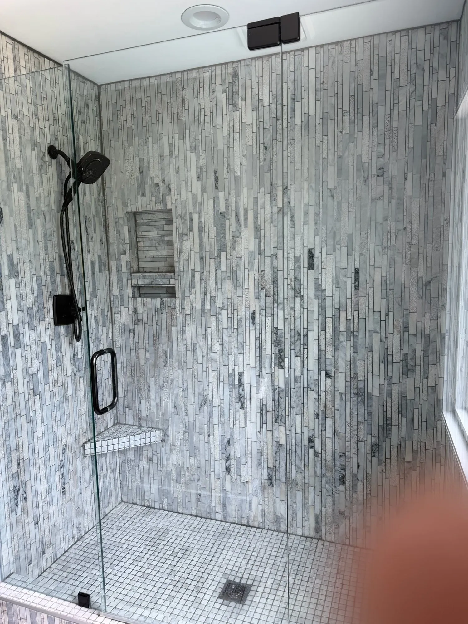 Custom stacked stone tile shower